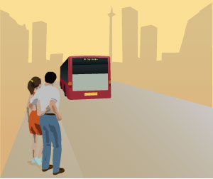Picture of a couple watching a bus disappear in the distance.
