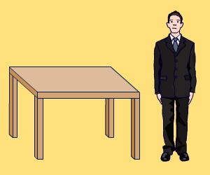 Person standing next to a table.